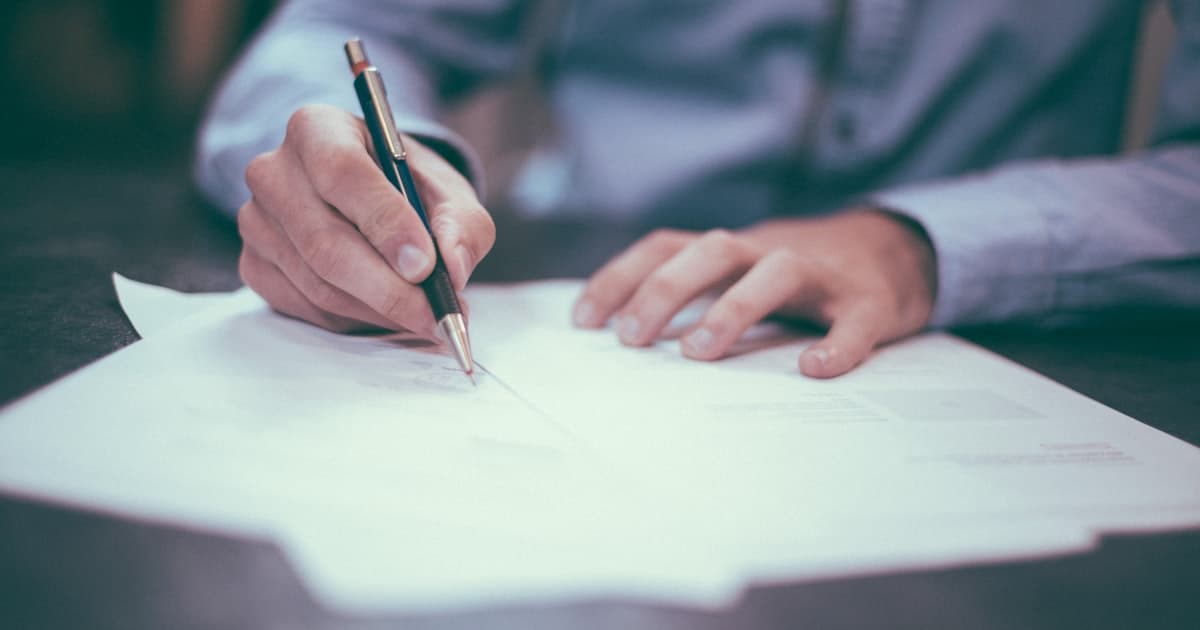 Trade documents and customs paperwork on a desk